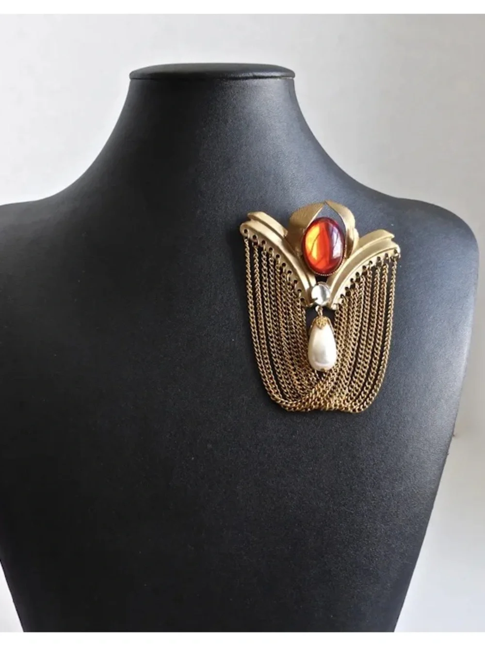 Large gold Tone Vintage Brooch w/Red Oval Stone, Faux Pearl Drop & chain Fringe.
